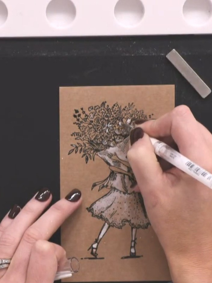 Passo 4: Using a fine brush, add small touches of white paint to some of the flowers in the tree for additional dimensi