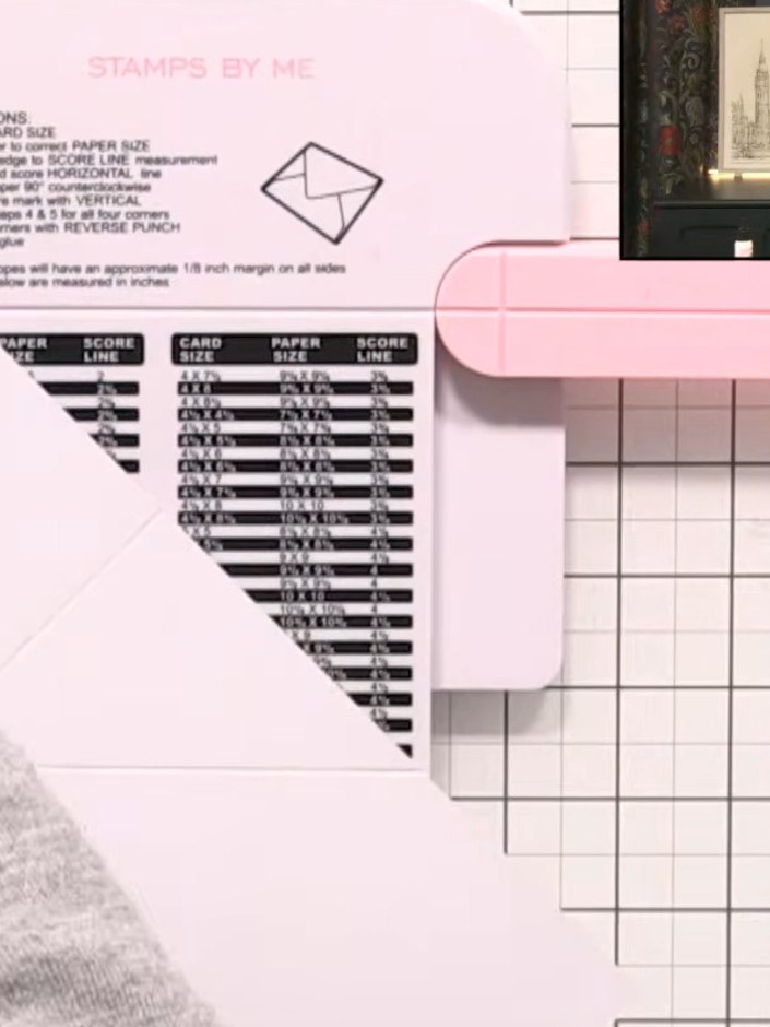 Step 6: Remove the small triangular pieces that appear in the corners of the scored card using the punch tool. Pop the
