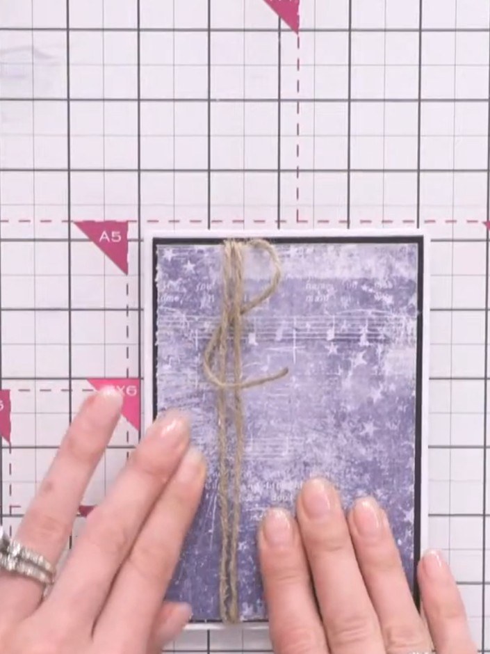 Step 11: Decorate your coordinating envelope using off-cuts from your card-making. Adhere the decorative pieces to the 