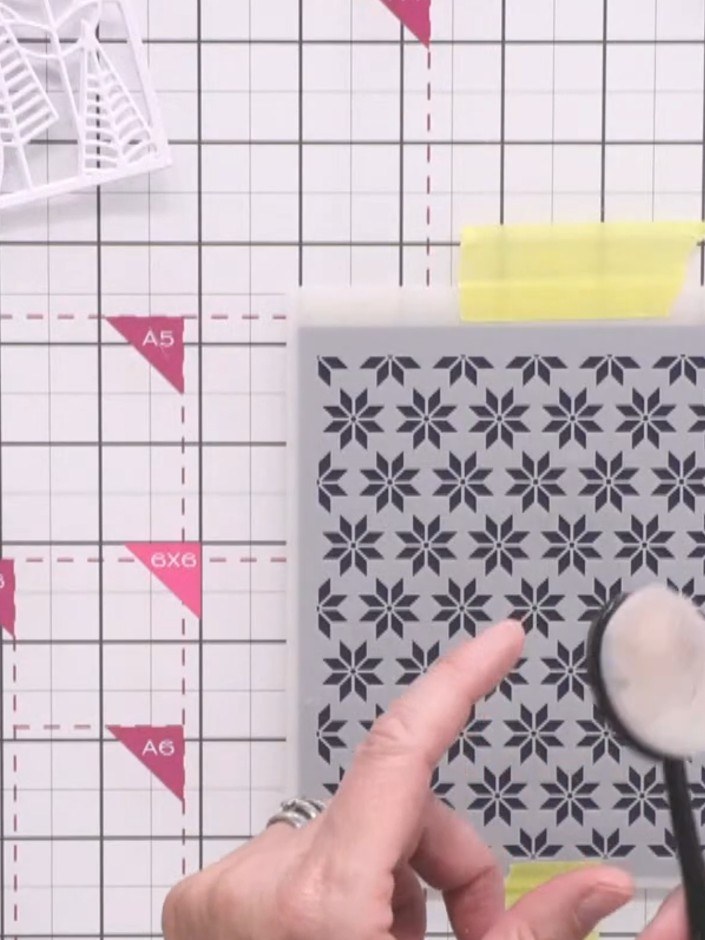 Step 2: Apply Versamark embossing ink to the white cardstock using a blending tool, working carefully over the positio