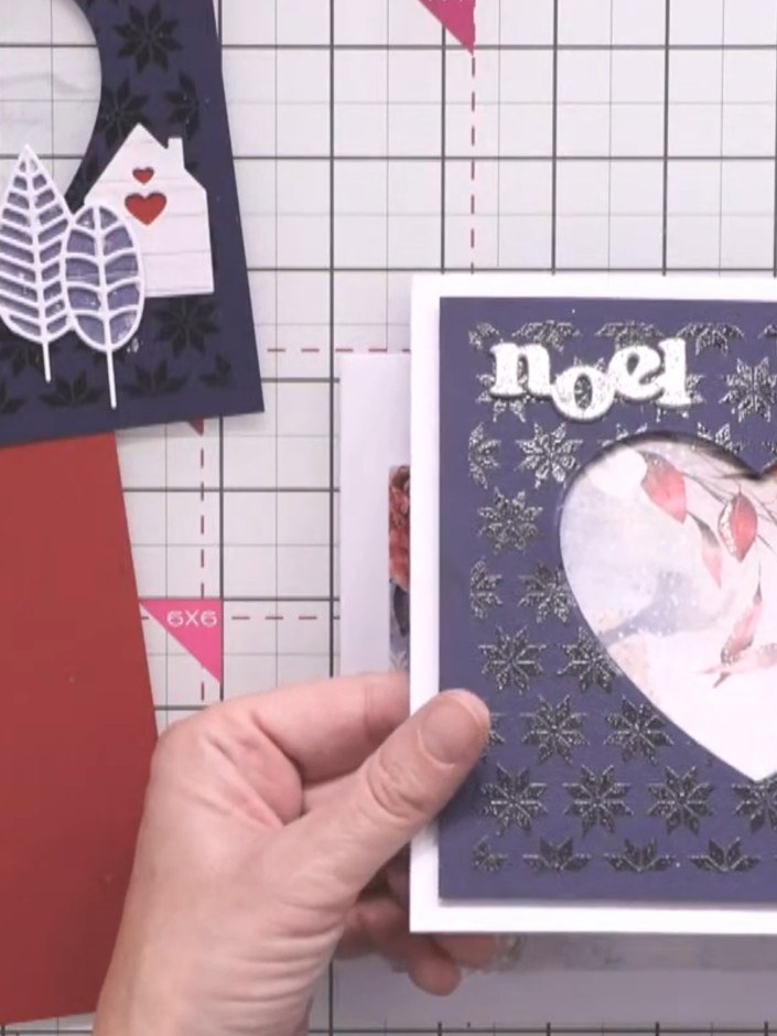 Step 8: Apply embossing ink to selected areas of the patterned paper using a Versamark pen. Heat emboss with glitter p