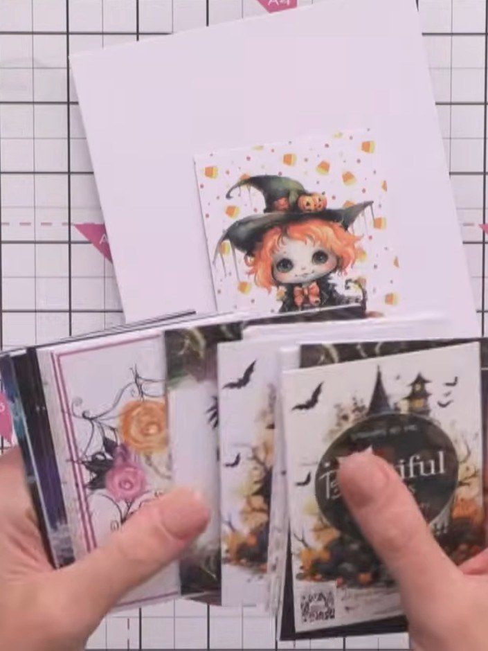 Step 1: Select a card blank from your kit. Choose from the available designs - the witch character, the vampire charac