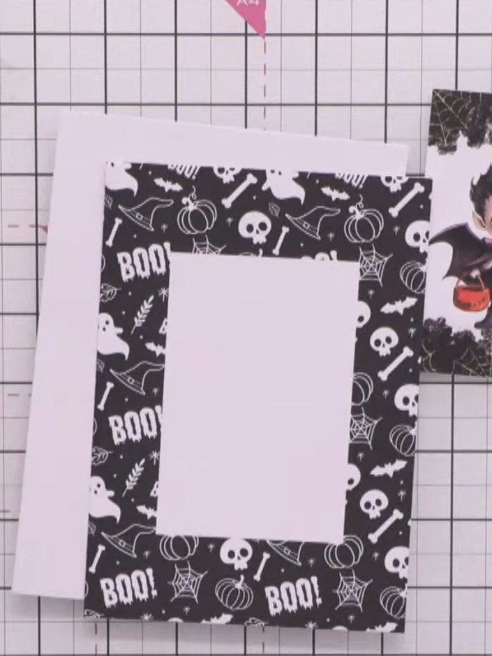 Step 6: Use the die provided in the kit to cut out the sentiment banner from white cardstock. Position the die over yo