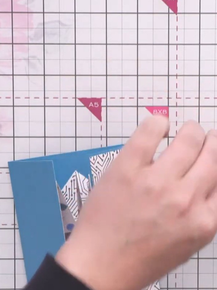 Step 5: Cut a strip of blue card measuring 3 inches by 9½ inches for the belly band.