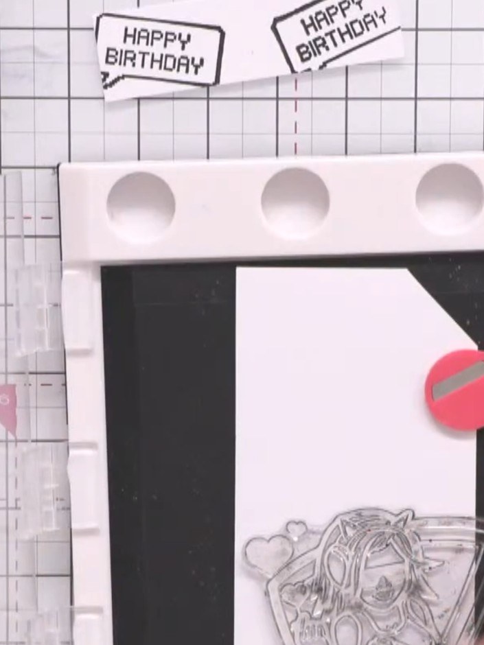 Step 1: Stamp a large character image onto white card using black ink. Position the stamp carefully on the stamping pl