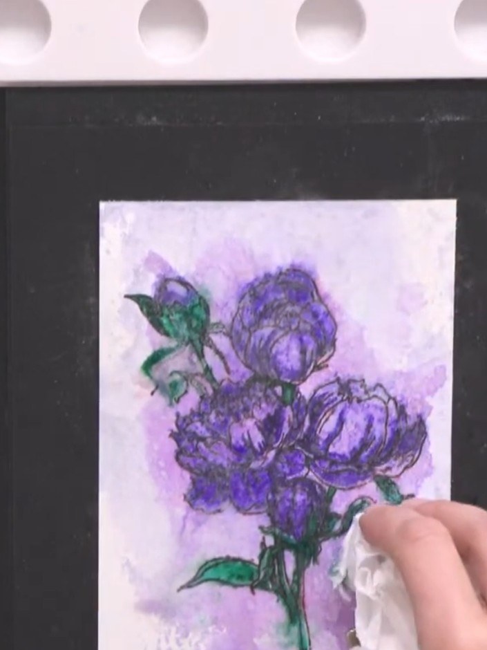 Step 15: Position stencil two over your stamped image again. Use the purple ink pad to dab through the stencil, reinfor
