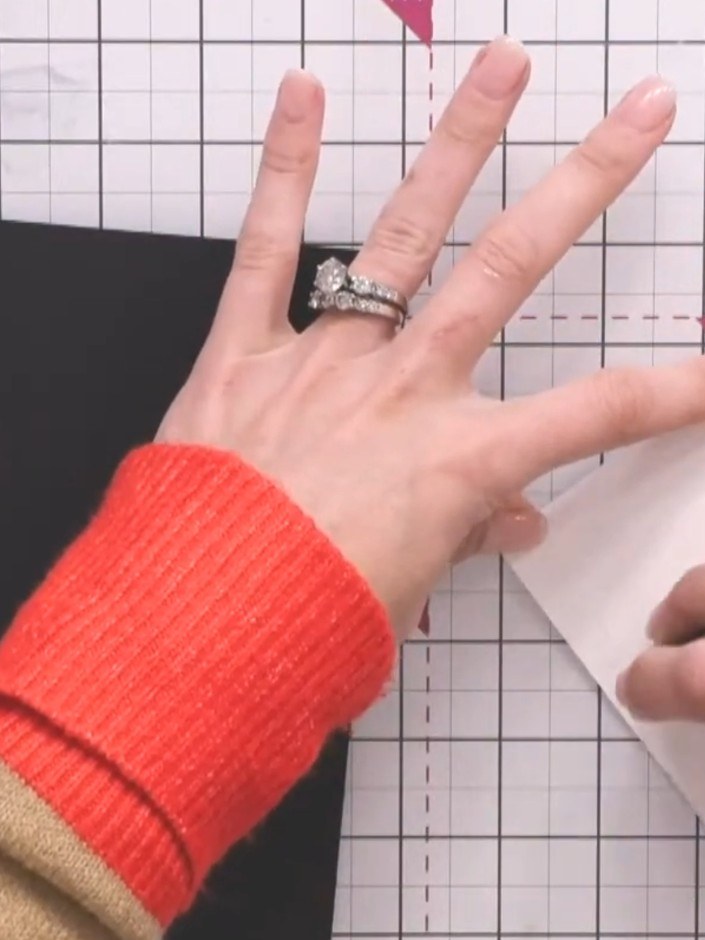 Step 16: Mount your finished watercolour artwork onto black cardstock to create a striking base for your card. Position