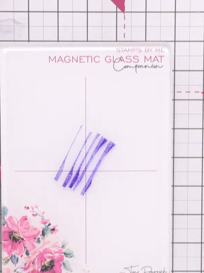 Step 2: Apply Indigo ink from the ink pad directly onto the magnetic glass mat in diagonal strokes. Keep the purple in