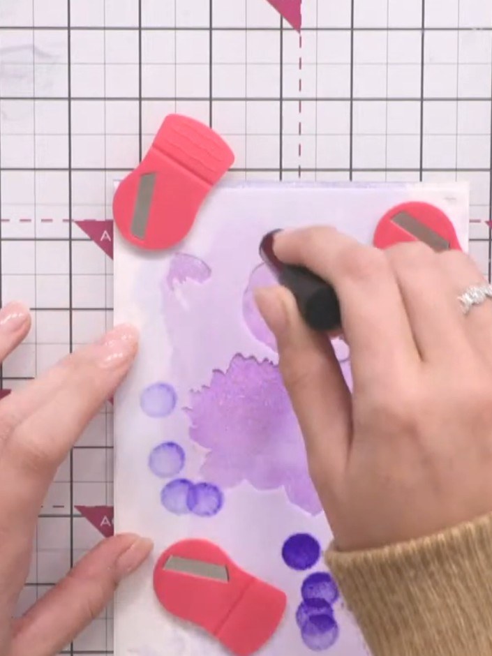 Step 6: Using a mini sponge applicator, apply blue ink through the stencil openings, working the colour through to cre