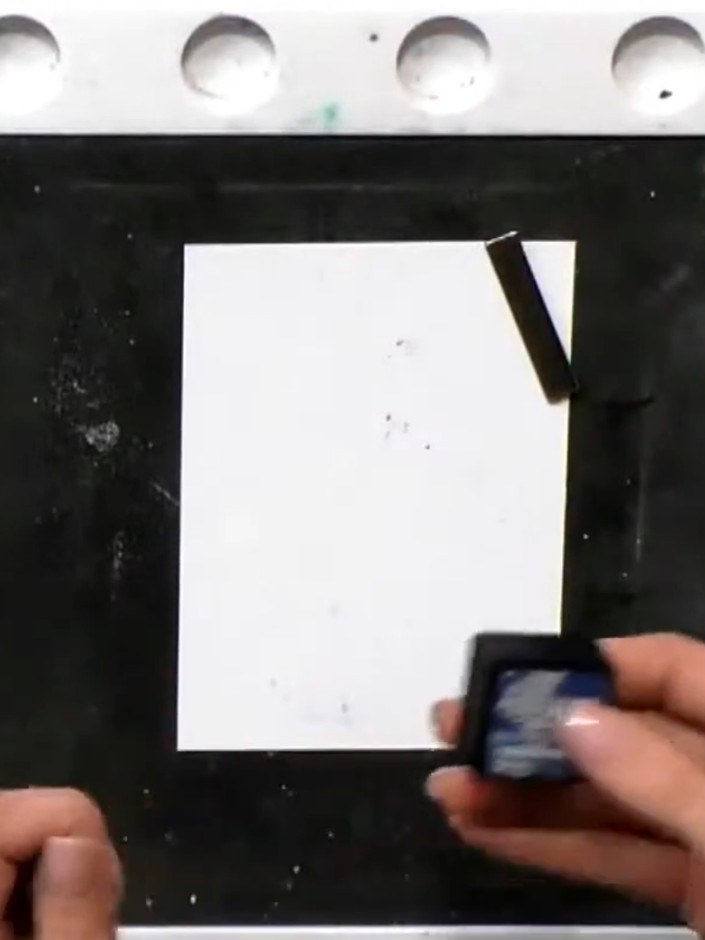 Step 1: Stamp the wine bottle outline stamp onto white cardstock using a chip sapphire ink pad.