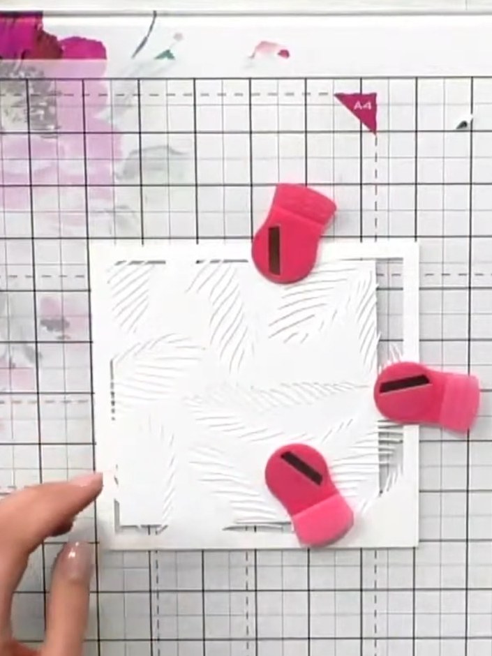 Step 1: Place a piece of white cardstock on your craft mat as the base for your card. Position it ready for adding ste