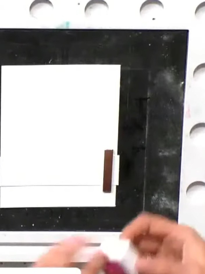 Step 4: Take your stamped watercolour panel and position it onto your white card base. Press down firmly to adhere the