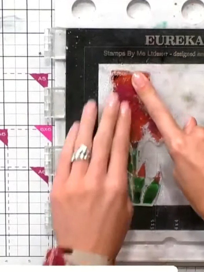 Step 9: Layer your completed iris design onto coordinating cardstock to add dimension. Use the Eureka 101 mat to help 
