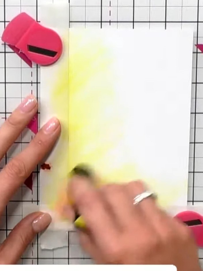 Step 4: Carefully peel away the masking tape from the card to reveal the soft yellow halo background effect around whe