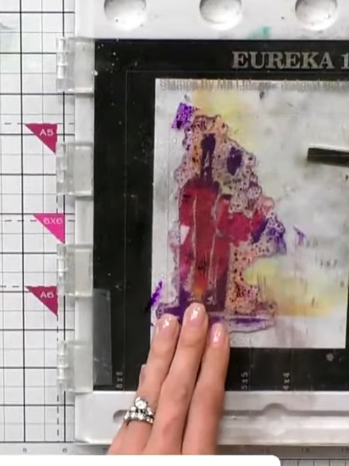 Step 9: Position the sentiment stamp '100 chance of wine' below the watercolour design and stamp it using black ink on