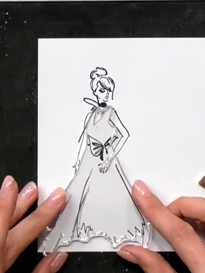 Step 6: Stamp the gown image over the figure outline on white card, using the blended ink colours to create an ombré e