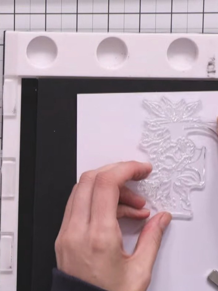 Step 2: Place your large F stamp face-up on the Eureka 101 stamping tool. Apply sticky ink evenly across the entire st