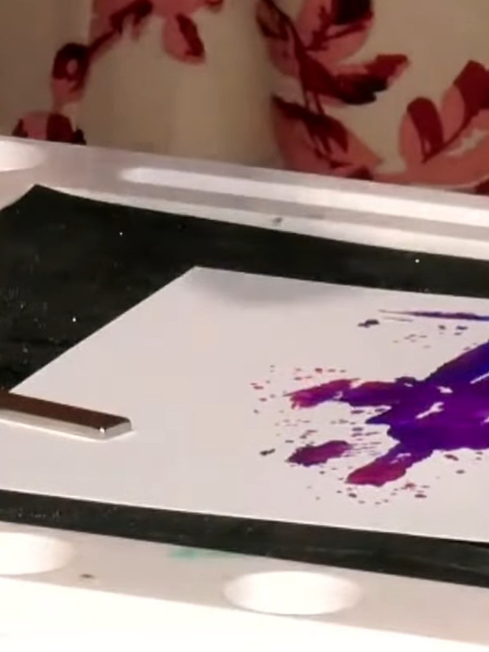 Step 6: Heat emboss the outline stamp using your heat tool to create a coordinated sparkly finish. Apply the embossing