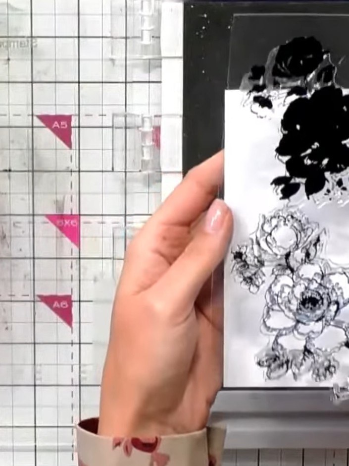 Step 1: Stamp the solid portion of the rose design onto white cardstock using a black ink pad. Position the stamp care