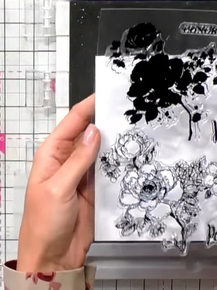 Step 2: Apply multiple ink pad colours directly to the stamped floral design. Use pinks, oranges and greens to create 