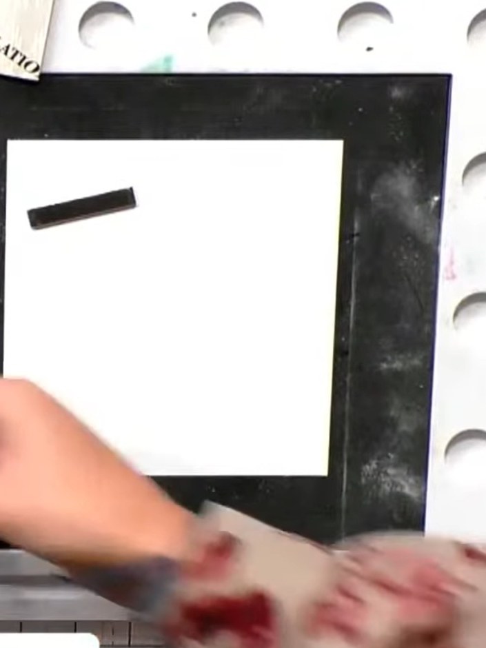 Step 6: Once the watercoloured design is dry (use a heat tool if needed), carefully line up the black outline stamp ov
