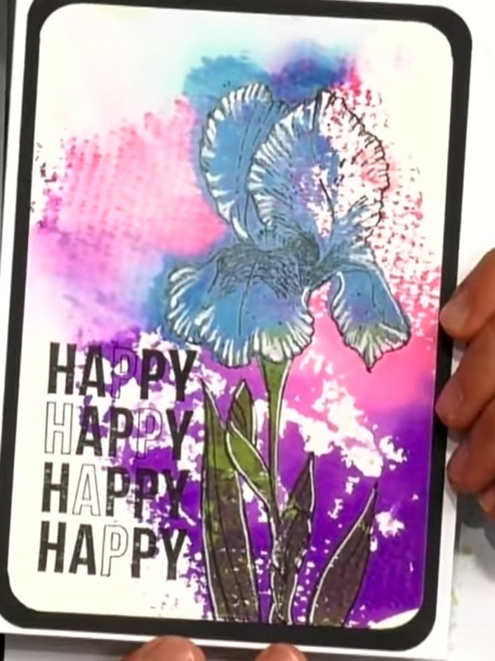 Step 3: Stamp your chosen sentiment onto the card. Position the 'HAPPY' repeated text stamp to the right side of the i