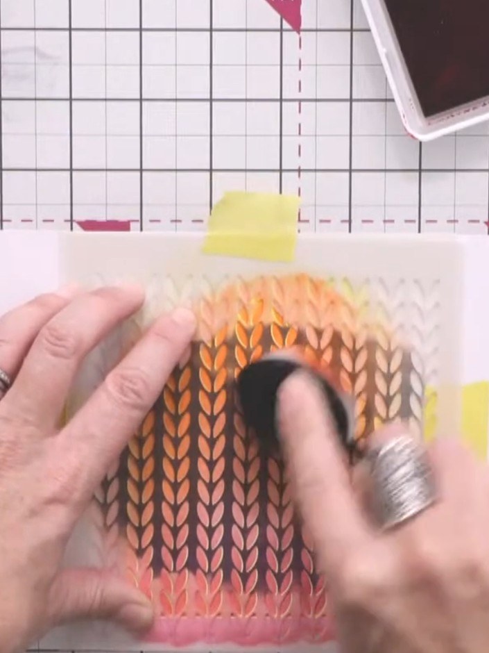 Step 5: Apply indigo ink to the bottom section of the knitted pattern stencil. Soften and blend the transition between