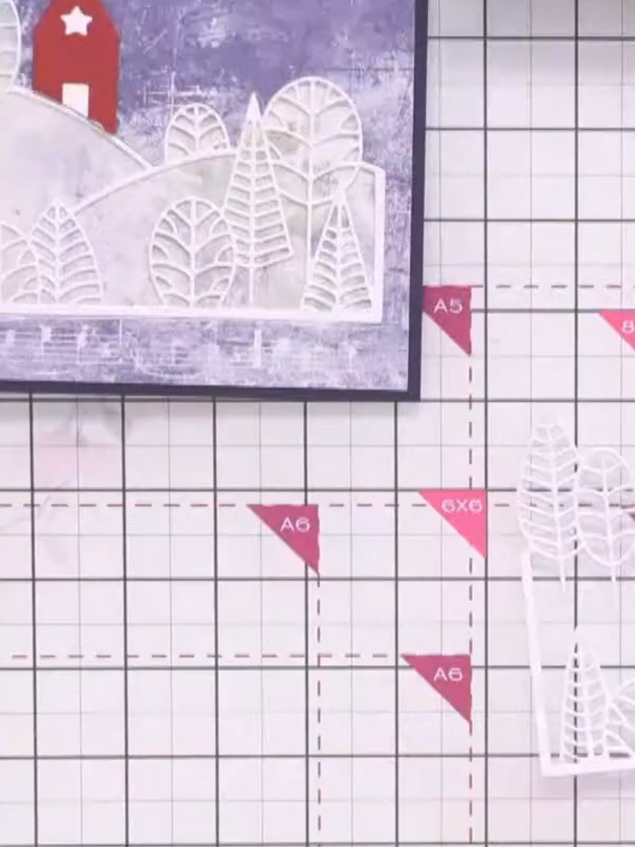 Step 10: Sprinkle sparkling snow embossing powder over the wet embossing ink on the tree die-cuts. Use a heat tool to m