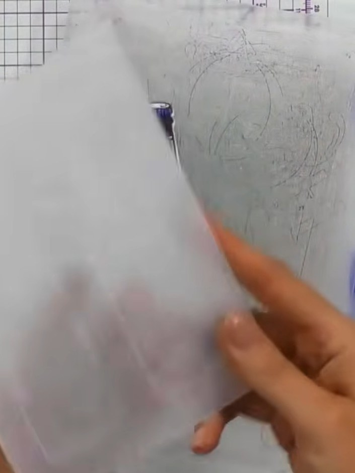 Step 8: Place your stamped card front into the embossing folder and run it through your die-cutting machine to add emb