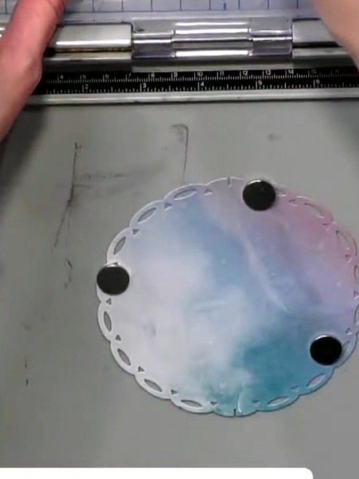 Step 4: Insert the bottom tab of one aperture piece into the top slot of the other aperture piece. Ensure the pieces c