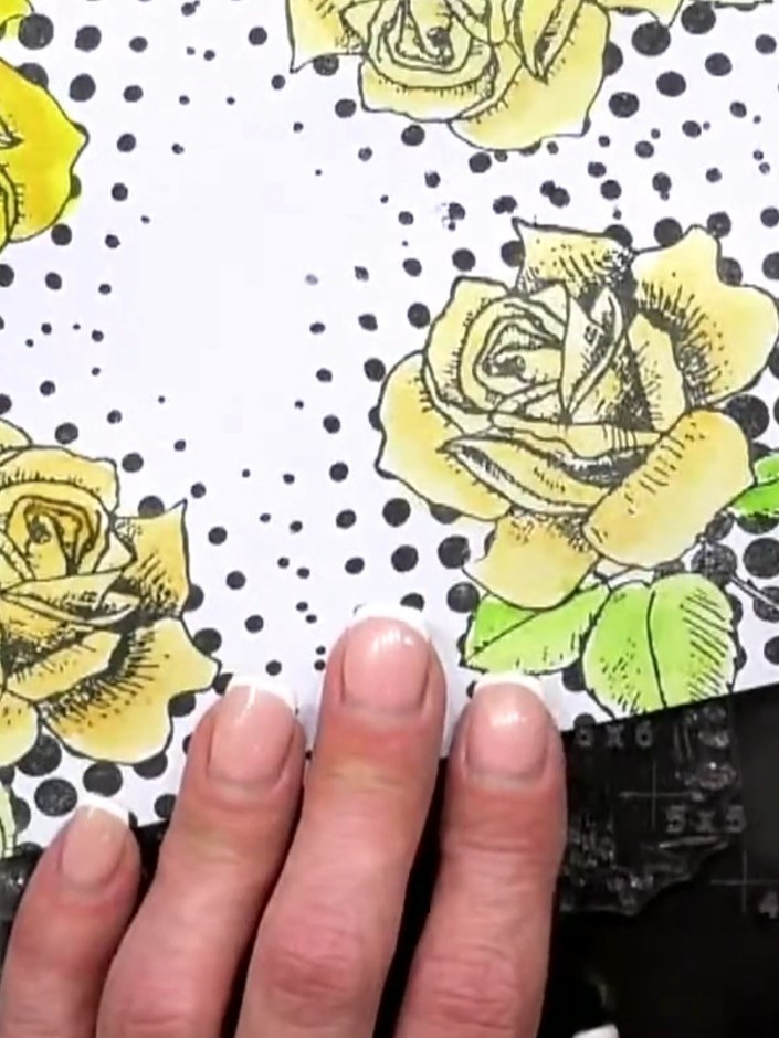 Step 1: Stamp yellow roses and green leaves onto white cardstock using the IMALA stamp set and black ink. Add a polka 