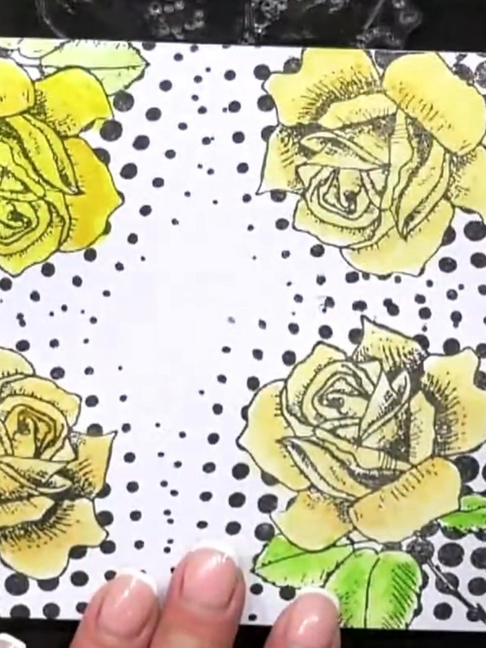 Step 3: Drop watercolour paint onto the wet surface in various colours including yellow, pink, blue and green, allowin
