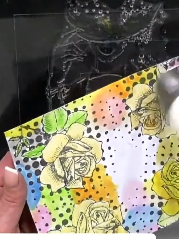Step 8: Soften the edges of the watercolour background by adding clean water with a damp brush. Blend gently to create