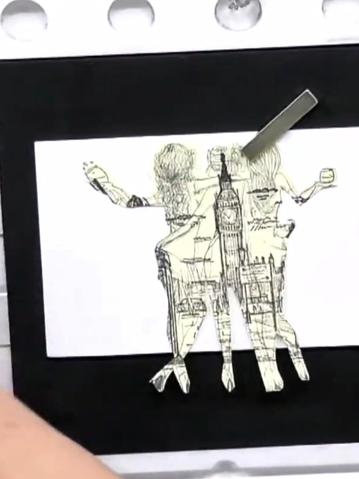 Step 3: Position the stamped cow mask on your white cardstock using low-tack adhesive tape. Place it over the area whe