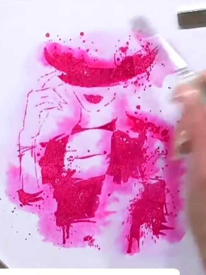 Step 6: Using a water brush or damp paintbrush, gently blend and soften the edges of the stamped image to create a wat