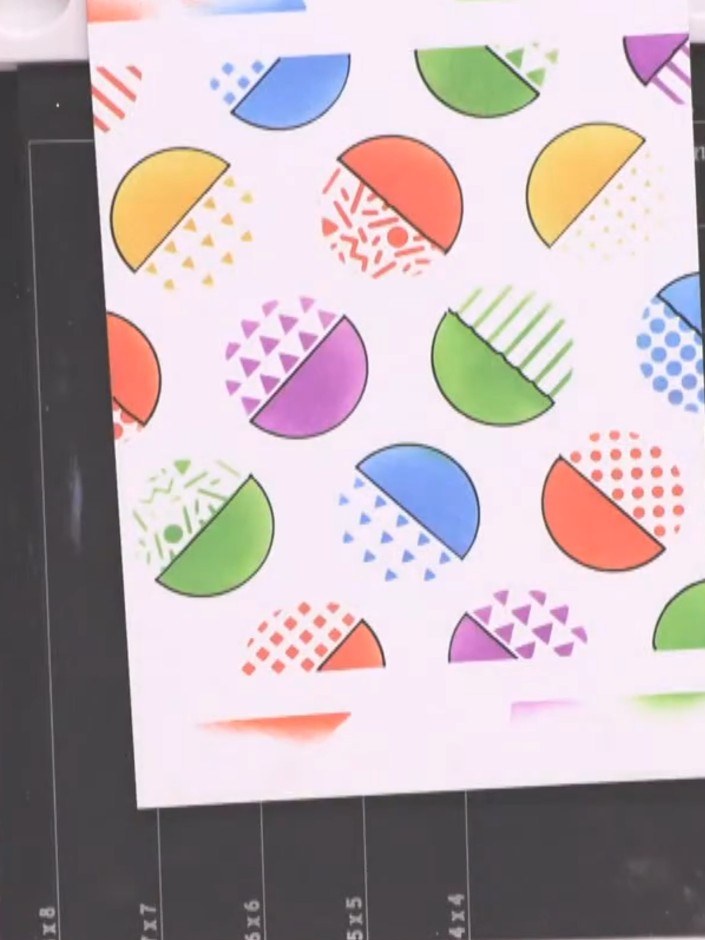 Step 9: Mount the finished panel onto a slightly larger card base using wet glue to complete your card. The retro dots