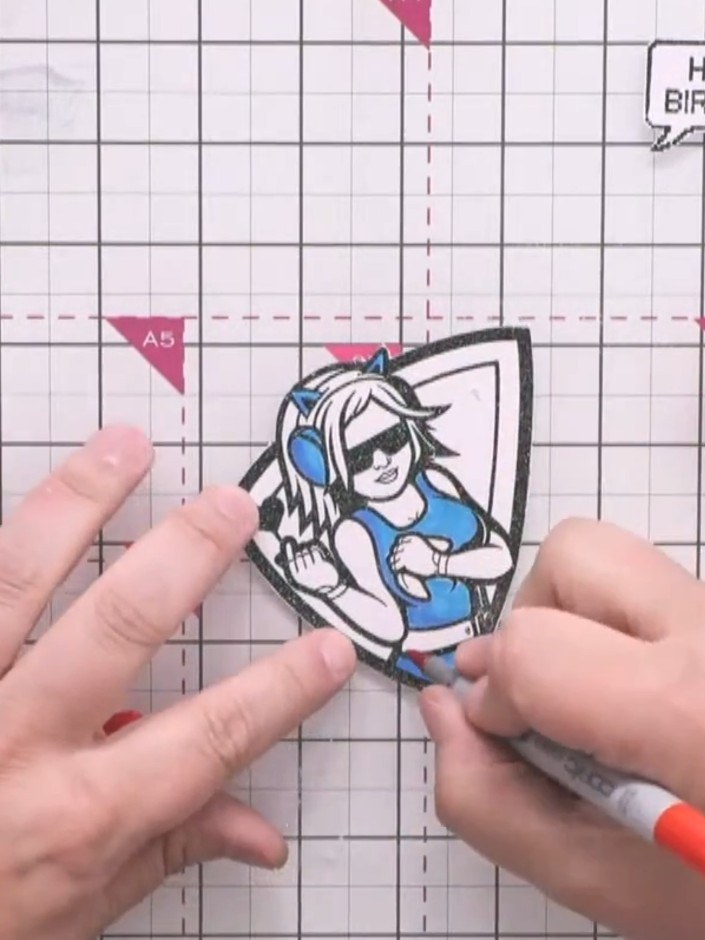 Step 10: Apply foam pads to the back of the coloured character stamp and adhere it to the centre of the card base, posi