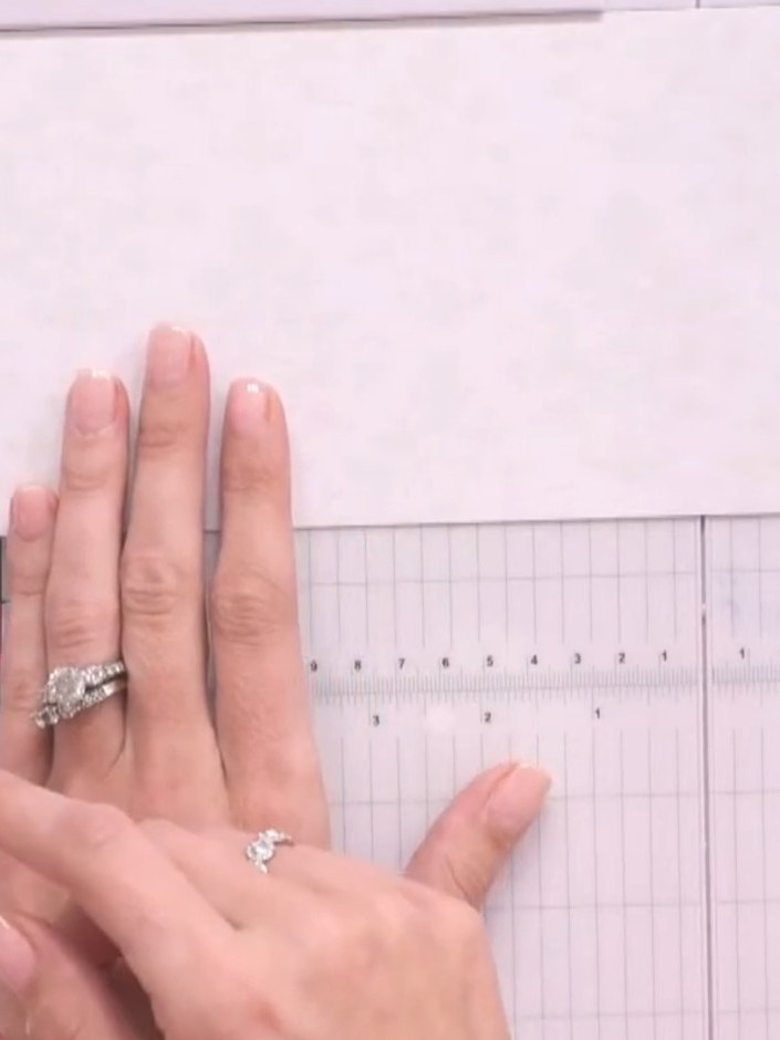 Step 4: Score a line approximately 1 inch (2.5 cm) from the fold on your white cardstock to create the tunnel channel 