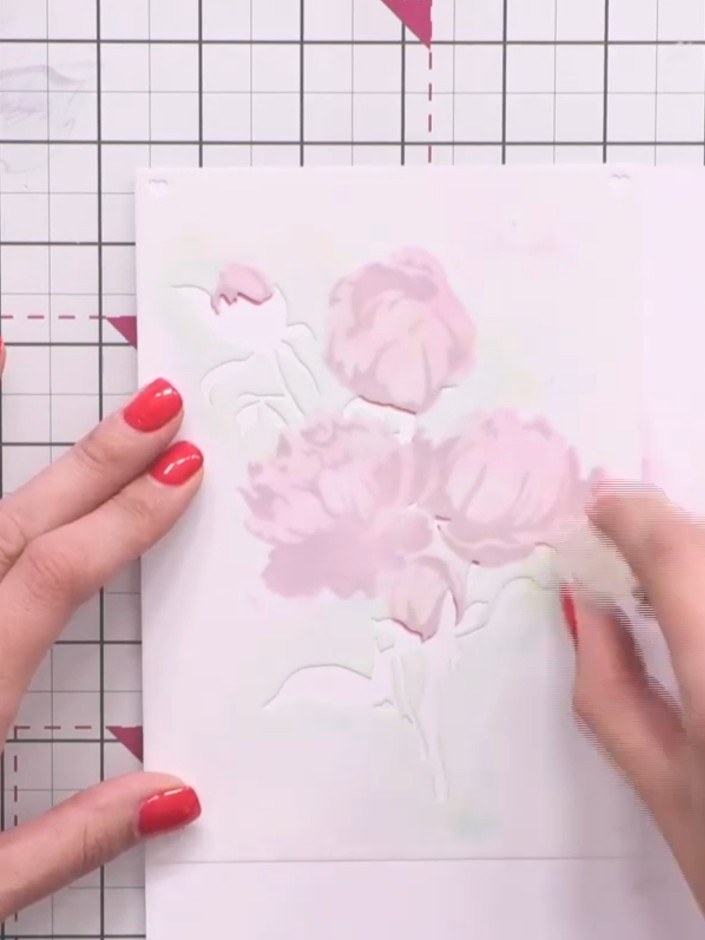 Step 4: Position stencil three over the image and apply a light green ink through it using a blending tool. Add touche