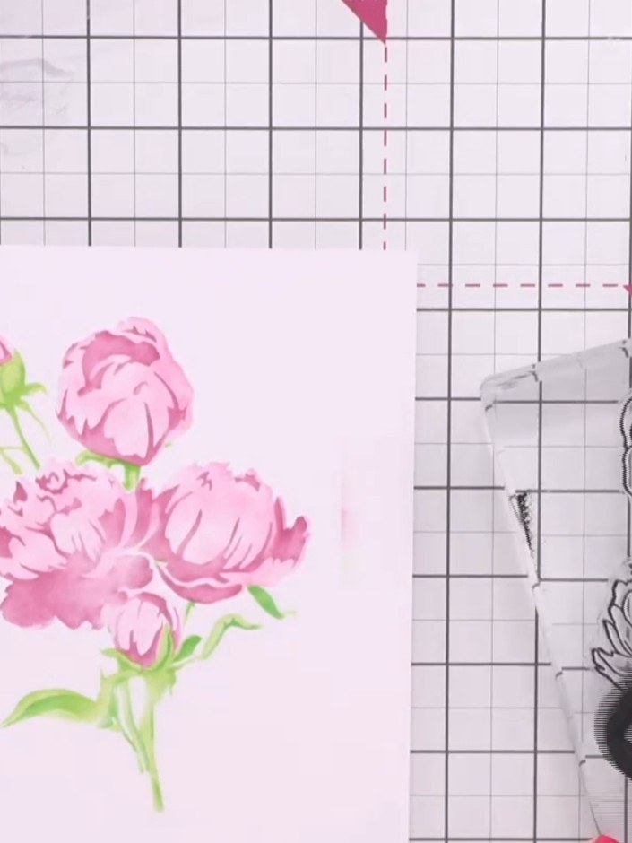 Step 5: Line up the peony stamp on top of your stencilled design and press down firmly using a black ink pad to add de