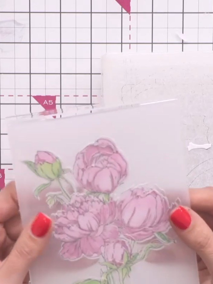 Step 7: Place your die-cut peony design into the 3D embossing folder with the raised part positioned on the back. Ensu