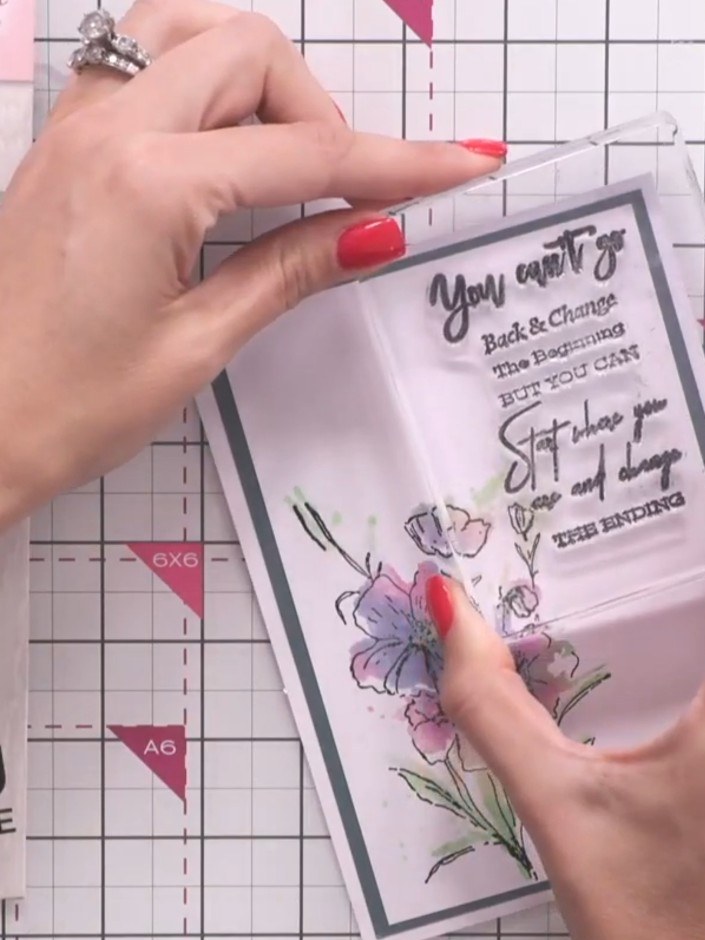 Step 12: Position a sentiment stamp from the collection at the top corner or side of your card as desired. Stamp the se