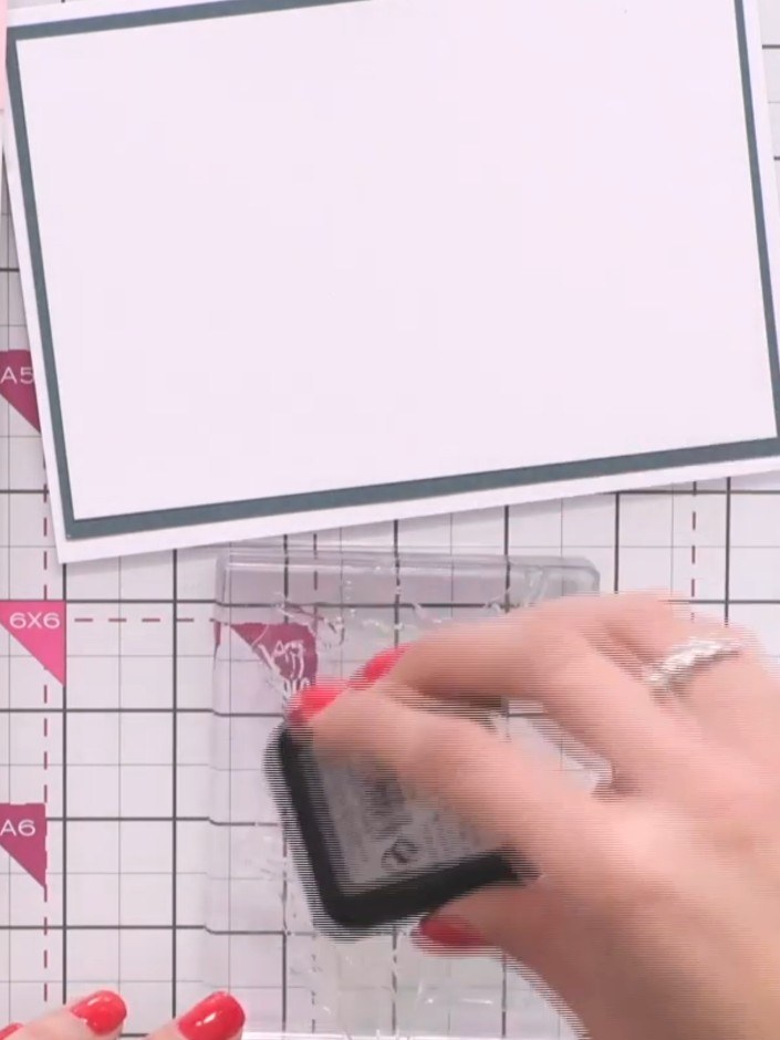 Step 3: Using a stamping tool with dark blue ink, add touches of colour to areas of the stamped design to create dimen