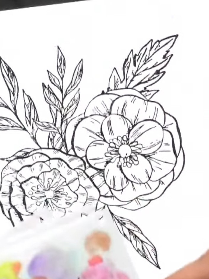 Passo 2: Position the second stencil layer over your stamped flower image, aligning it roughly with the flowers. This w