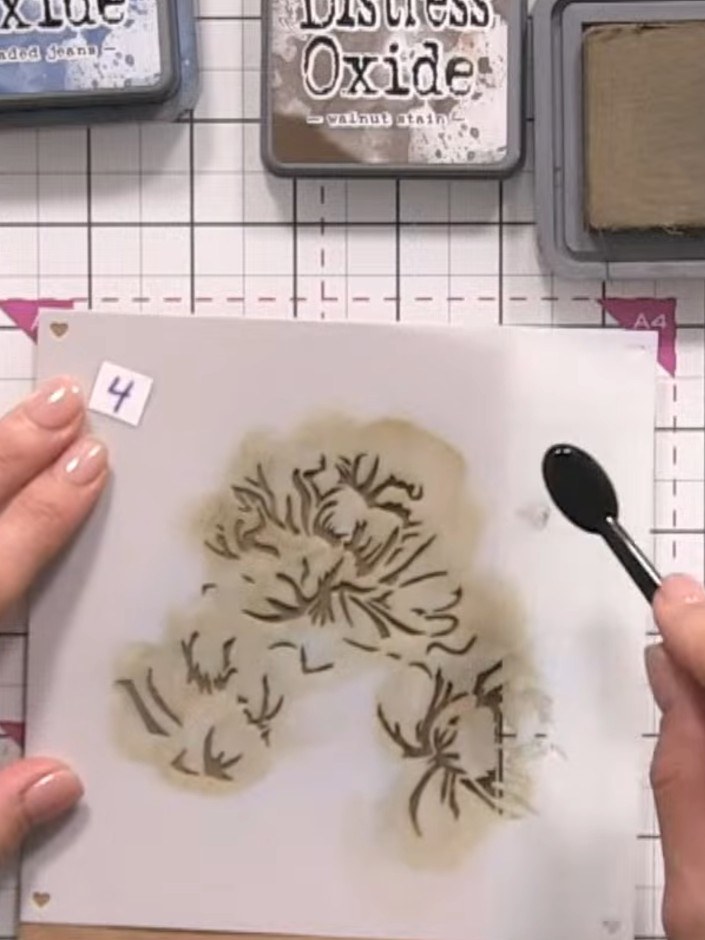 Step 8: Using black ink, add shading to the final flower layer to deepen the shadows and create contrast. Apply the in