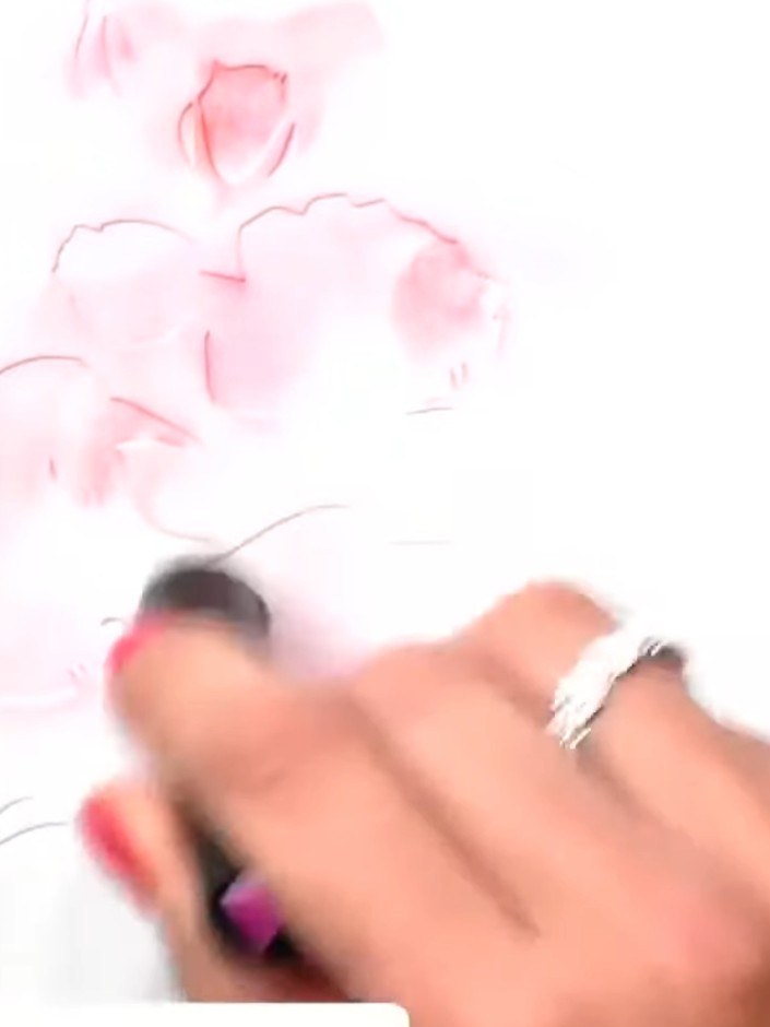 Paso 3: Position the second stencil layer over your work, aligning the heart registration marks with those from the fi