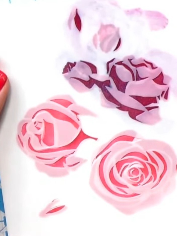 Paso 7: Position the coordinating die around the completed stencilled rose design. Run through your die-cutting machin