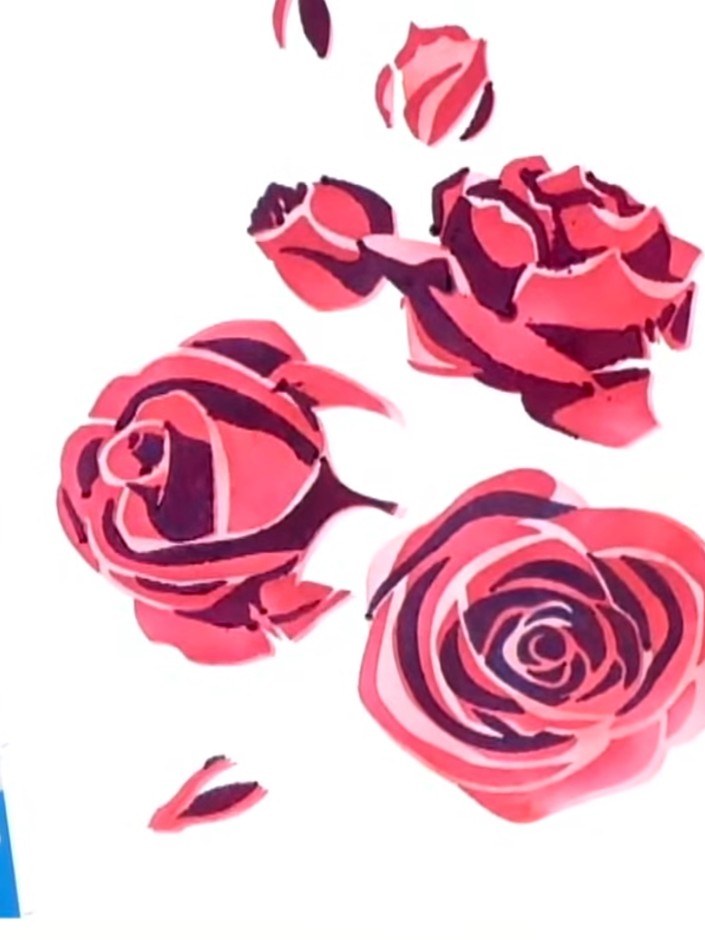 Paso 8: Remove the die from the card to reveal the finished three-dimensional rose design with all white areas cleanly