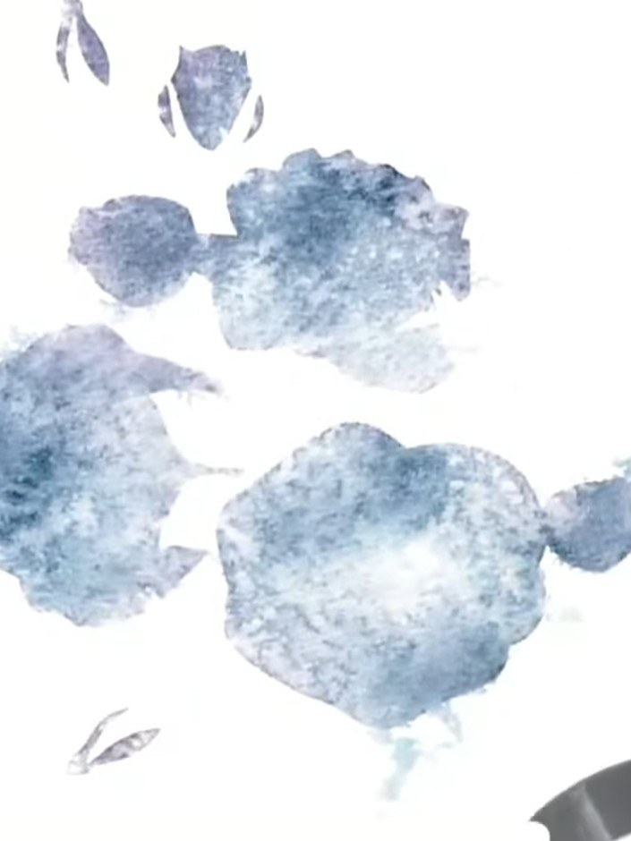 Passo 4: Position the second stencil layer over your card and apply a contrasting colour such as teal through the stenc