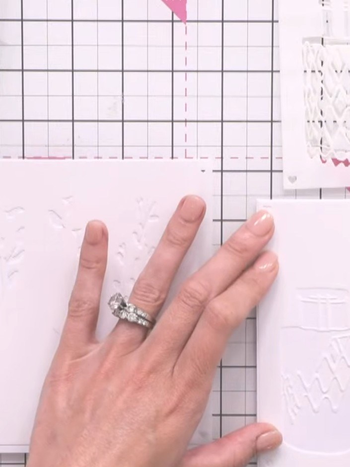 Step 3: Position your second foliage stencil over the card, aligning it carefully with the first layer. Use the blendi